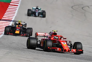 AUSTIN, TX - OCTOBER 21:  Kimi Raikkonen of Finland driving the (7) Scuderia Ferrari SF71H leads Max Verstappen of the Netherlands driving the (33) Aston Martin Red Bull Racing RB14 TAG Heuer and Lewis Hamilton of Great Britain driving the (44) Mercedes AMG Petronas F1 Team Mercedes WO9 on track during the United States Formula One Grand Prix at Circuit of The Americas on October 21, 2018 in Austin, United States.  (Photo by Clive Mason/Getty Images)