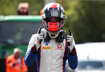 SPA, BELGIUM - AUGUST 27: Pole position qualifier Jack Doohan of Australia and Trident  celebrates