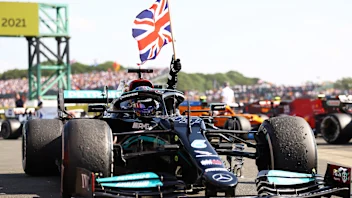 NORTHAMPTON, ENGLAND - JULY 18: Race winner Lewis Hamilton of Great Britain and Mercedes GP