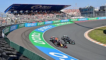 Mercedes' British driver Lewis Hamilton (R) and Red Bull's Dutch driver Max Verstappen (L) steer