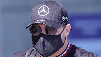 Mercedes' Finnish driver Valtteri Bottas arrives ahead of the first practice session at the