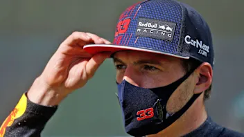 Third placed Red Bull's Dutch driver Max Verstappen reacts after the qualifying session at the