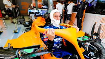 Daniel Ricciardo, McLaren enters his cockpit in the team's