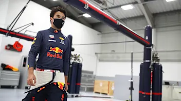 MILTON KEYNES, ENGLAND - JANUARY 12: Sergio Perez of Mexico and Red Bull Racing walks in the