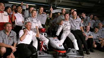 1 Nov 1998:  The McLaren Mercedes team celebrates a winning year after the Japanese Grand Prix at