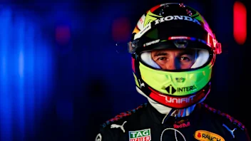 NORTHAMPTON, ENGLAND - FEBRUARY 24: Sergio Perez of Mexico and Red Bull Racing poses for a photo