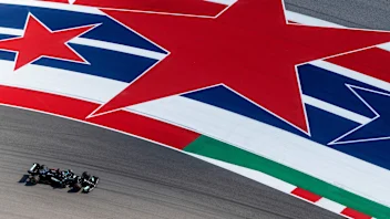 Mercedes' British driver Lewis Hamilton races during the first practice session at the Circuit of