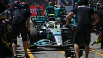 Mercedes' British driver Lewis Hamilton makes a pit stop during the second practice session at the