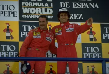 1990:  Scuderia Ferrari drivers Nigel Mansell (left) of Great Britain and Alain Prost (right) of