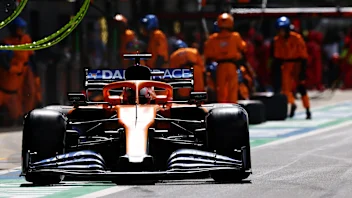 NORTHAMPTON, ENGLAND - AUGUST 02: Carlos Sainz of Spain driving the (55) McLaren F1 Team MCL35