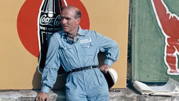 The Italian Grand Prix; Monza, September 13, 1953. Giuseppe  Nino  Farina in a reflective moment.