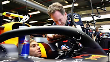 MELBOURNE, AUSTRALIA - MARCH 15: Pierre Gasly of France and Red Bull Racing talks with Red Bull