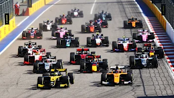 SOCHI, RUSSIA - SEPTEMBER 27: Guanyu Zhou of China and UNI-Virtuosi Racing (3) leads Jack Aitken of
