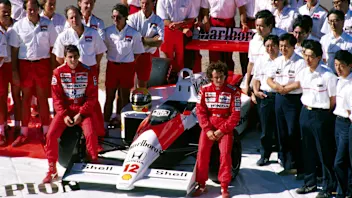 Ayrton Senna (BRA) (Left) and Alain Prost (FRA) (Right) the McLaren Honda team celebrate winning