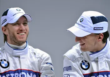 VALENCIA, SPAIN - JANUARY 20:  BMW Sauber drivers Nick Heidfeld (R) of Germany and Robert Kubica of