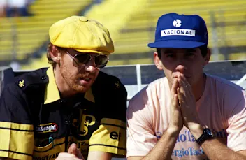 Ayrton Senna (BRA) (Right) with his Lotus Engineer Steve Hallam (Left). Senna retired in the