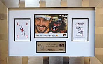 The StarCards framed photo and signature of Fernando Alonso (ESP) McLaren MP4-30.  The drivers