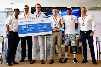 ABU DHABI, UNITED ARAB EMIRATES - NOVEMBER 23:  Benjamin Lambert and Alexander Gibson are presented
