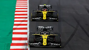 Daniel Ricciardo, Renault R.S.20, leads Esteban Ocon, Renault