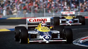 Nelson Piquet, Nigel Mansell, Williams-Honda FW11, Grand Prix of France, Circuit Paul Ricard, 06 July 1986. Nelson Piquet leads Williams-Honda teammate Nigel Mansell. (Photo by Paul-Henri Cahier/Getty Images)