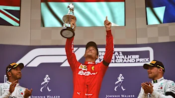 The podium (L to R): Lewis Hamilton (GBR) Mercedes AMG F1, second; Charles Leclerc (MON) Ferrari,