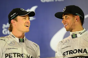 Nico Rosberg (GER) Mercedes AMG F1 and Lewis Hamilton (GBR) Mercedes AMG F1 on the podium. Formula