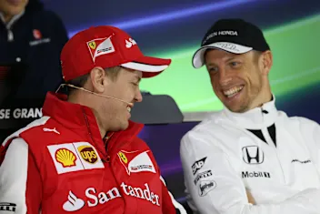 Sebastian Vettel (GER) Ferrari and Jenson Button (GBR) McLaren in the Press Conference at Formula
