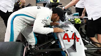YAS MARINA CIRCUIT, UNITED ARAB EMIRATES - NOVEMBER 24: Lewis Hamilton kisses his Mercedes AMG F1