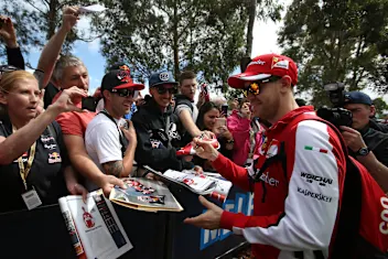 Sebastian Vettel (GER) Ferrari signs autographs for the fans at Formula One World Championship,