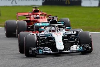 SPA-FRANCORCHAMPS, BELGIUM - AUGUST 26: Lewis Hamilton, Mercedes AMG F1 W09, leads Sebastian Vettel, Ferrari SF71H during the Belgian GP at Spa-Francorchamps on August 26, 2018 in Spa-Francorchamps, Belgium. (Photo by Steve Etherington / LAT Images)