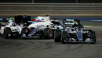 SAKHIR, BAHRAIN - APRIL 03: Nico Rosberg of Germany drives the (6) Mercedes AMG Petronas F1 Team Mercedes F1 WO7 Mercedes PU106C Hybrid turbo on track ahead of Lewis Hamilton of Great Britain drives the (44) Mercedes AMG Petronas F1 Team Mercedes F1 WO7 Mercedes PU106C Hybrid turbo as he gets hit by Valtteri Bottas of Finland drives the (77) Williams Martini Racing Williams FW38 Mercedes PU106C Hybrid turbo during the Bahrain Formula One Grand Prix at Bahrain International Circuit on April 3, 2016 in Sakhir, Bahrain.  (Photo by Lars Baron/Getty Images)