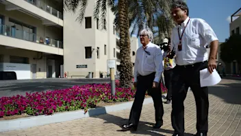 Bernie Ecclestone (GBR) CEO Formula One Group (FOM) and Pasquale Lattuneddu (ITA) of the FOM at