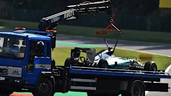 Nico Rosberg (GER) Mercedes AMG F1 W06 returns in the truck after his Pirelli tyre expolded in FP2