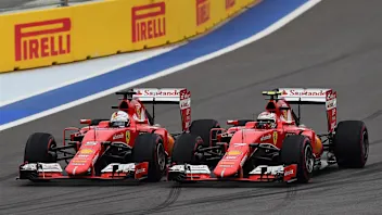 Sebastian Vettel (GER) Ferrari SF15-T and Kimi Raikkonen (FIN) Ferrari SF15-T battle at Formula One