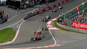 Max Verstappen (NED) Red Bull Racing RB12 and Kimi Raikkonen (FIN) Ferrari SF16-H with front