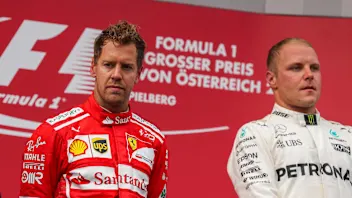 Sebastian Vettel (GER) Ferrari and Valtteri Bottas (FIN) Mercedes AMG F1 celebrate on the podium at