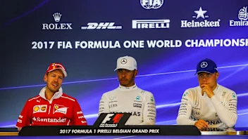 Sebastian Vettel (GER) Ferrari, Lewis Hamilton (GBR) Mercedes AMG F1 and Valtteri Bottas (FIN)