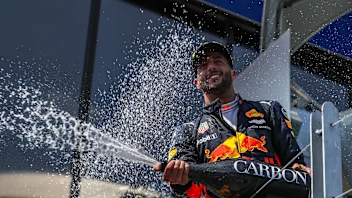 Daniel Ricciardo (AUS) Red Bull Racing celebrates on the podium with the champagne at Formula One