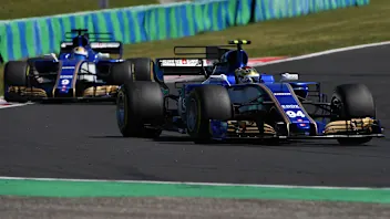 Pascal Wehrlein (GER) Sauber C36 and Marcus Ericsson (SWE) Sauber C36 at Formula One World