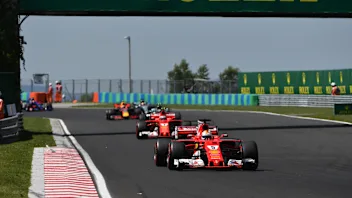 Sebastian Vettel (GER) Ferrari SF70-H leads at the start of the race at Formula One World