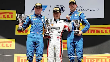 Race winner Nobuharu Matsushita (JPN) ART Grand Prix celebrates on the podium with the trophy