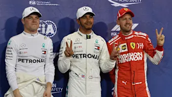 (L to R): Valtteri Bottas, Mercedes AMG F1, Lewis Hamilton, Mercedes AMG F1 and Sebastian Vettel,