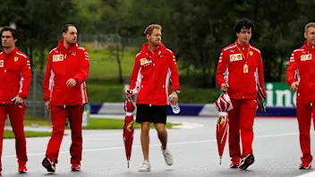 Sebastian Vettel (GER) Ferrari walks the track with the team at Formula One World Championship,