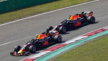 Max Verstappen (NED) Red Bull Racing RB14 leads Daniel Ricciardo (AUS) Red Bull Racing RB14 at