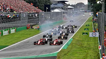 Sebastian Vettel, Ferrari SF71H and Kimi Raikkonen, Ferrari SF71H lead at the start of the race at