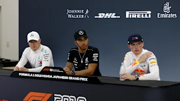 (L to R): Valtteri Bottas, Mercedes AMG F1, Lewis Hamilton, Mercedes AMG F1 and Max Verstappen, Red