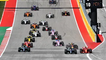 Kimi Raikkonen, Ferrari SF71H and Lewis Hamilton, Mercedes-AMG F1 W09 EQ Power+ battle at the start