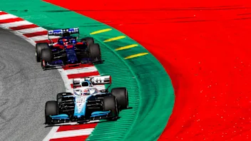 RED BULL RING, AUSTRIA - JUNE 28: George Russell, Williams Racing FW42, leads Daniil Kvyat, Toro