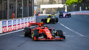 BAKU CITY CIRCUIT, AZERBAIJAN - APRIL 28: Charles Leclerc, Ferrari SF90, leads Daniel Ricciardo,