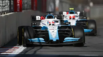 BAKU CITY CIRCUIT, AZERBAIJAN - APRIL 28: George Russell, Williams Racing FW42, leads Robert